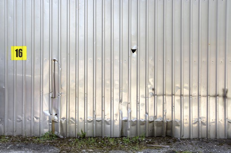 Damaged Aluminum Door Panel